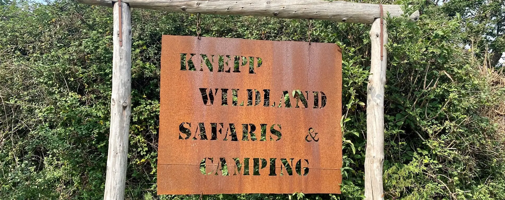 knepp estate sign - knepp wildland safaris and camping